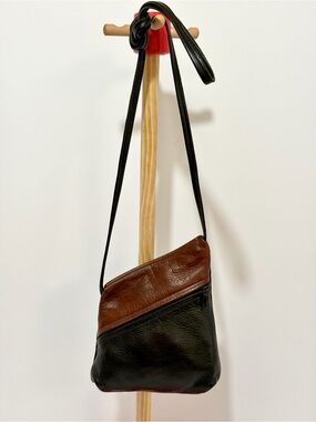 Thomas Leathers Slide Crossbody Bag In Black And Brown Colorblock